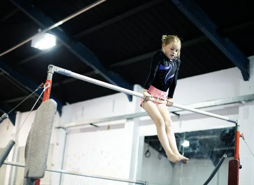 The Top 10 Gymnastics Moves For The Bars